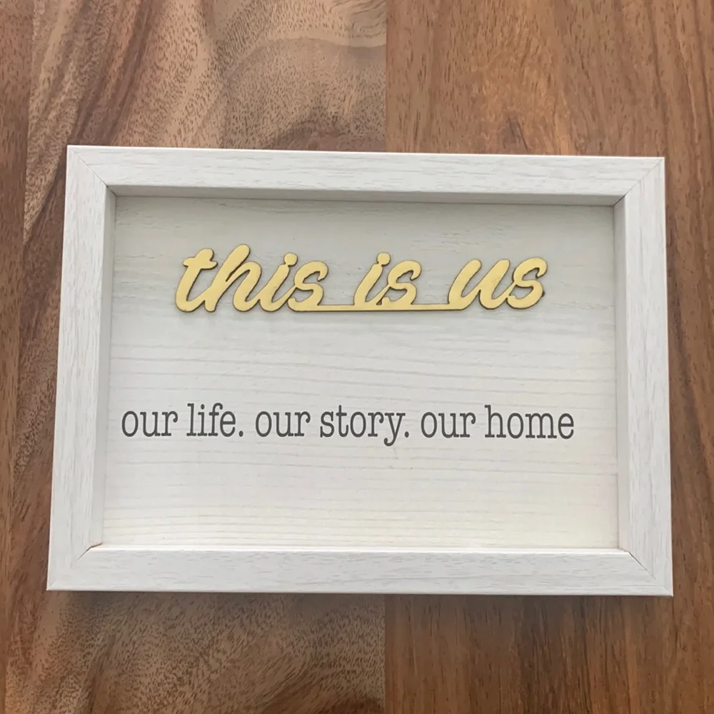 “this is us” sign